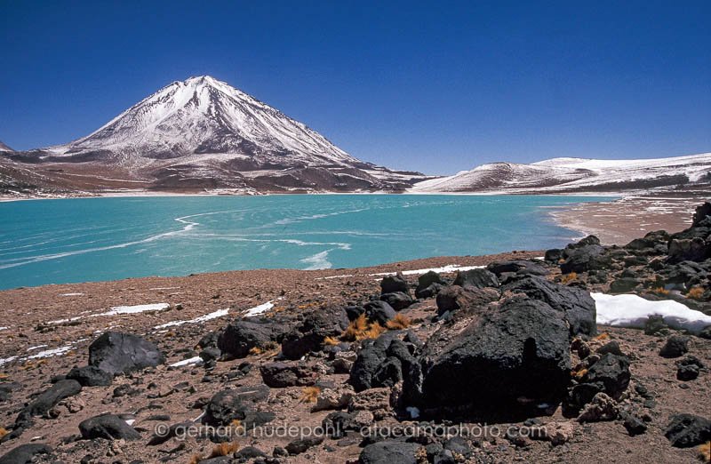 Laguna Verde and Licancabur volcano with snow